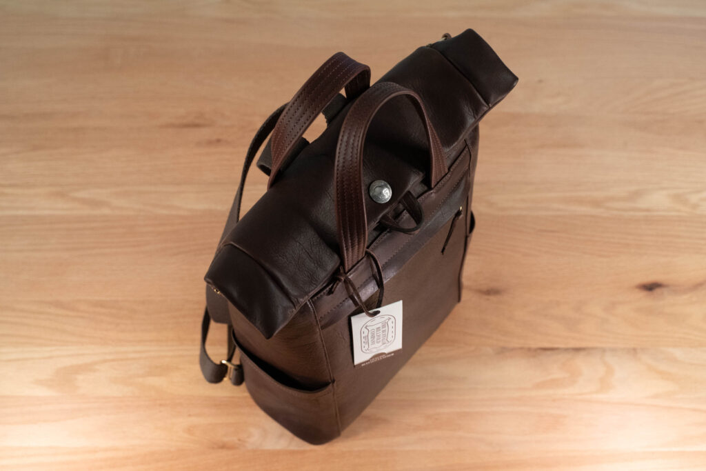 Left Side Profile Of Northbound Bison Leather Backpack